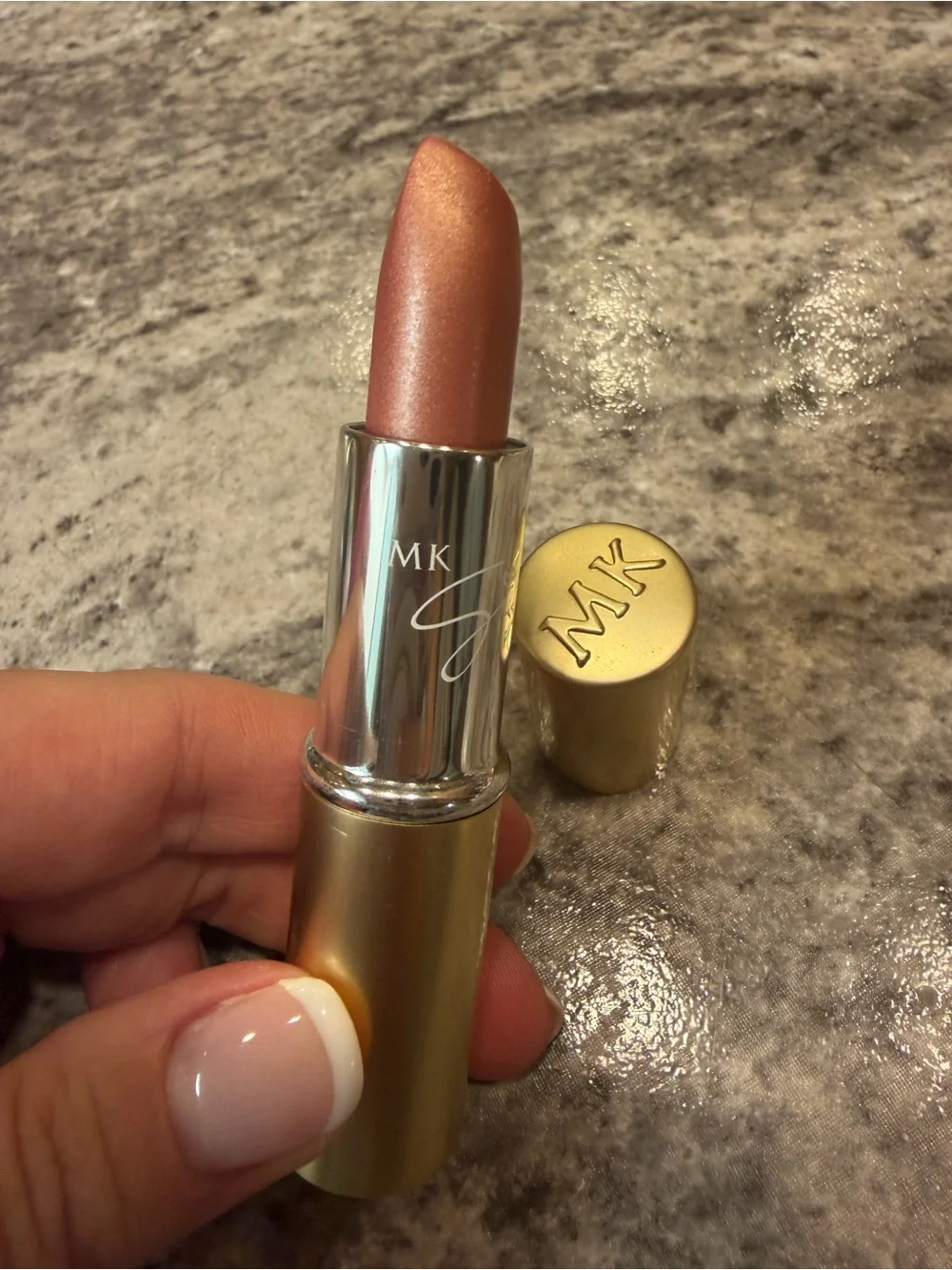 Mary Kay lipstick in the shade Juicy Peach